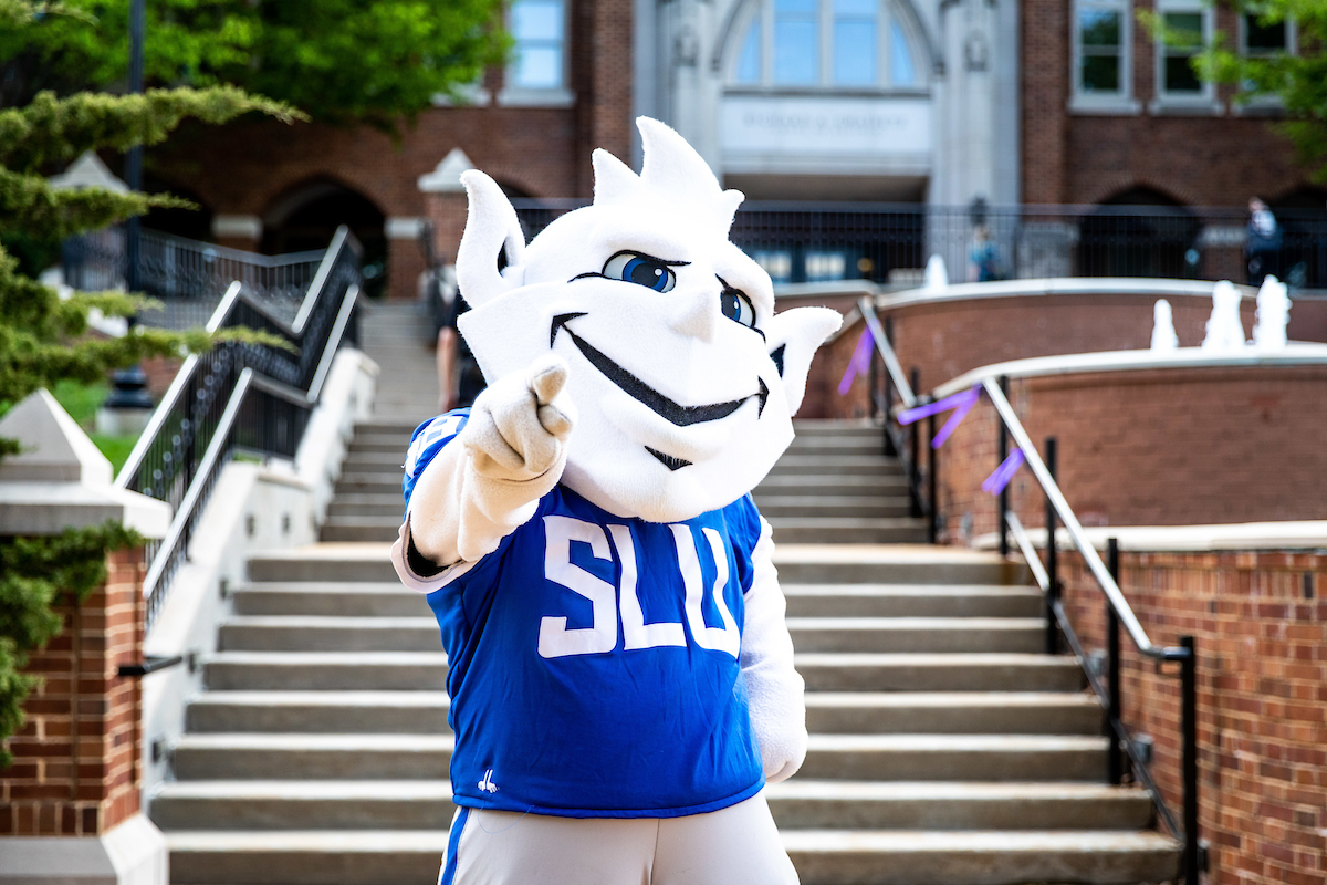 Saint ˻ֱ University Billiken Mascot pointing toward viewer