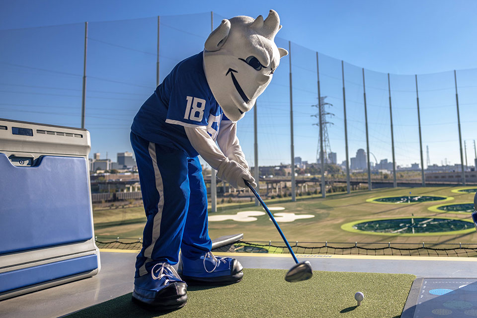 The Billiken tees off at the new Topgolf St. ˻ֱ Midtown after the ribbon-cutting ceremony on October 20, 2023.